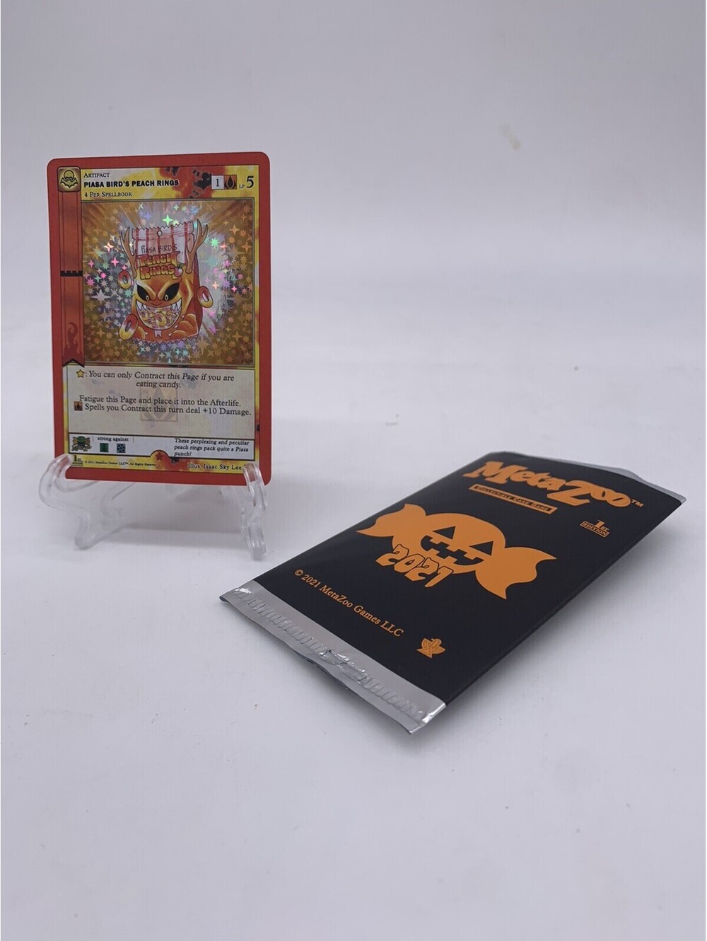 MetaZoo Piasa Bird’s Peach Rings 1st Edition -Holo-